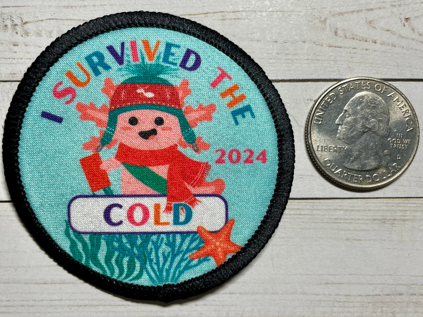 Cookie Season I Survived the Cold Axolotl Sublimated Patch | 2.57" Iron-On | Polyester Design | Winter Hat & Cookies 2024