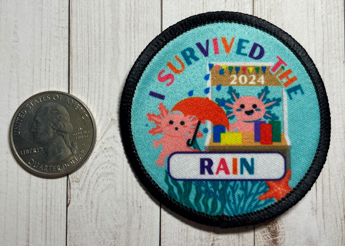 Cookie Season I Survived the Rain Axolotl Sublimated Patch | 2.57" Iron-On | Polyester Design | Umbrella Customer & Cookie Booth 2024
