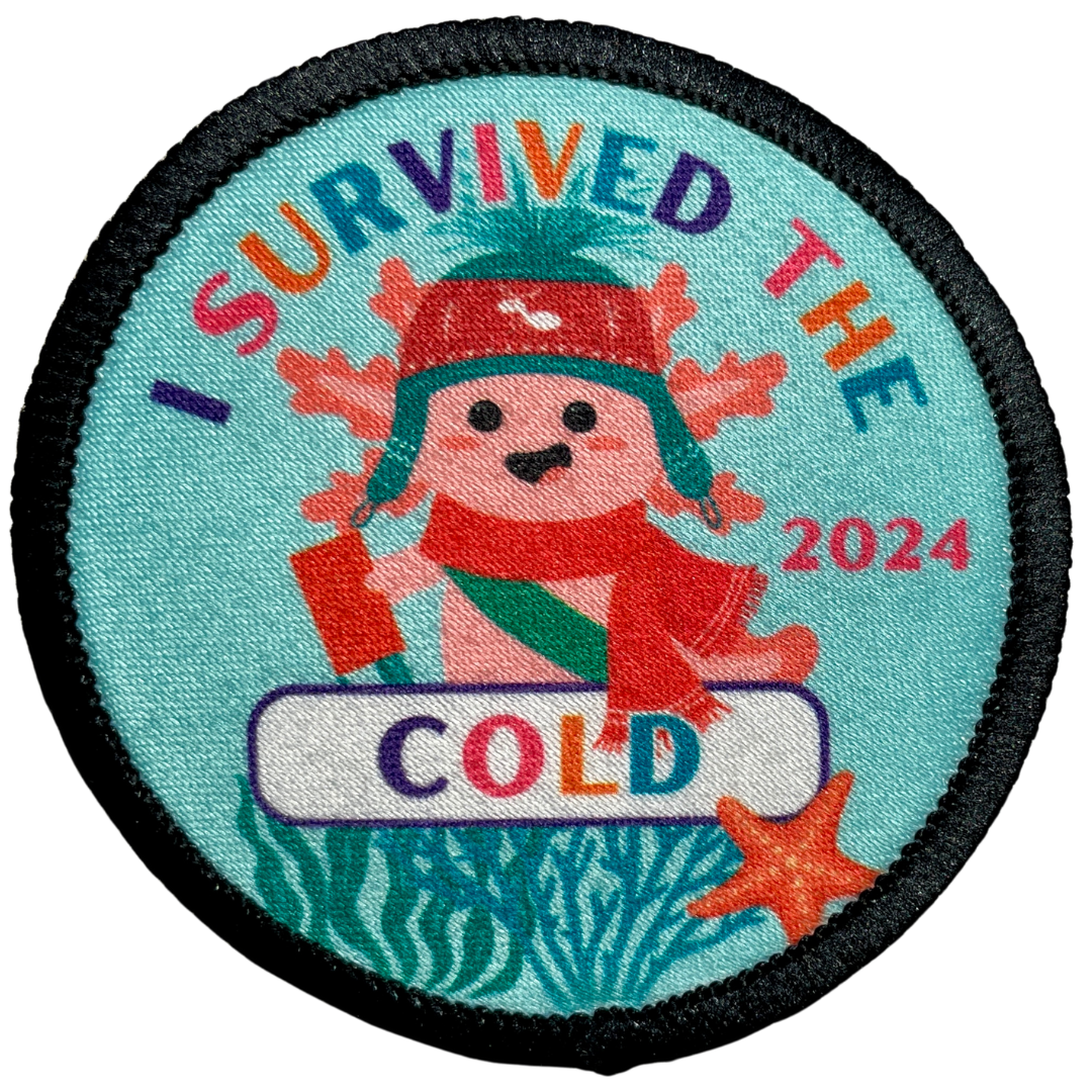 Cookie Season I Survived the Cold Axolotl Sublimated Patch | 2.57" Iron-On | Polyester Design | Winter Hat & Cookies 2024